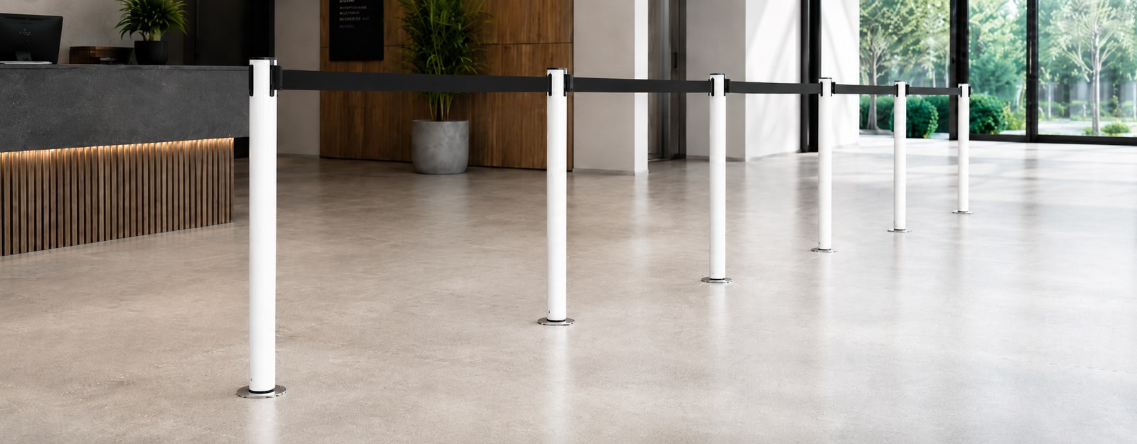Removable socketed barrier post: fixed anchoring, mobile freedom